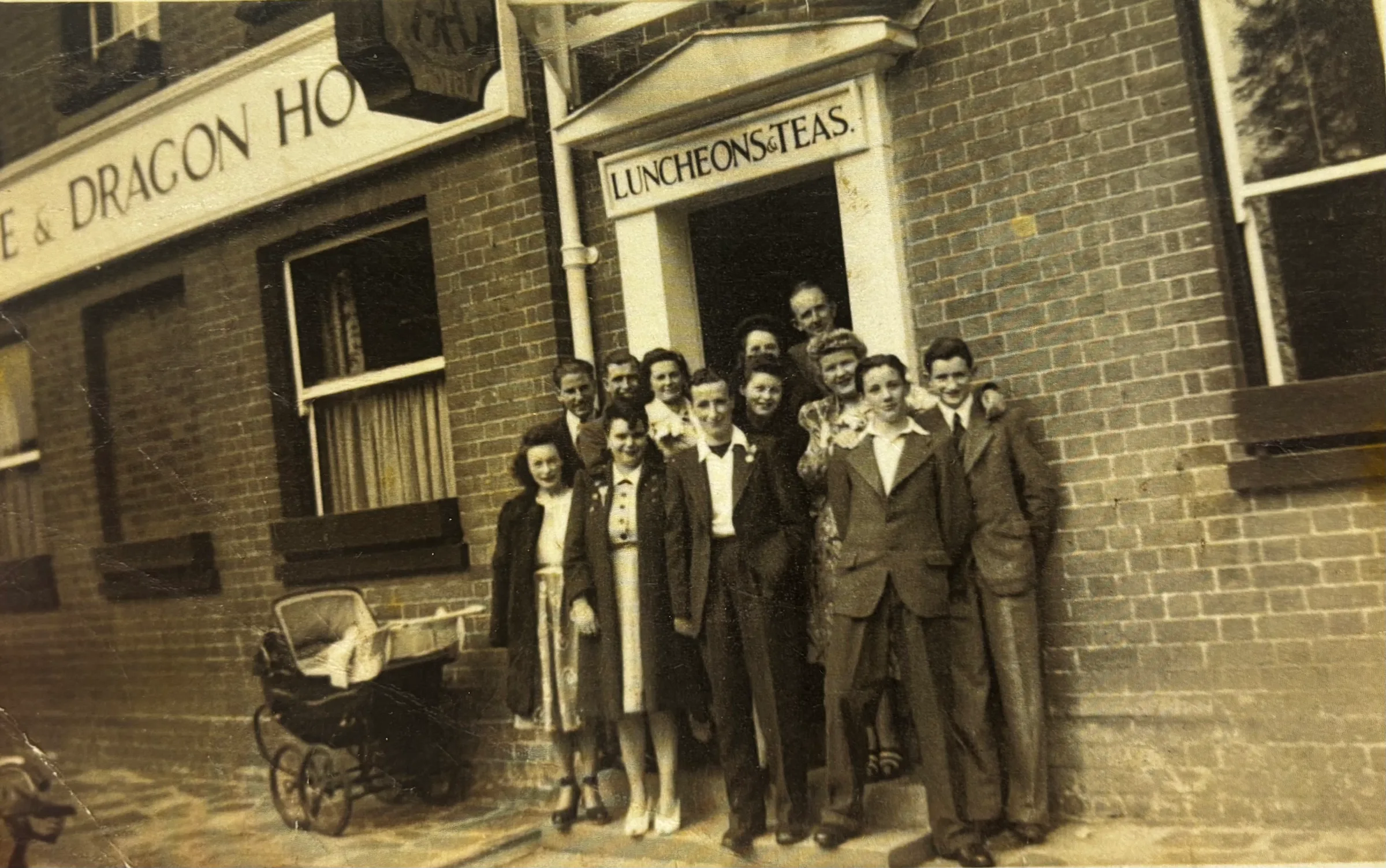 Charles Stanley Greaves 1932 – 2021, Hester Mary Begadon 1908 – 1992, Hilda Florence Begadon (b. 1922), and 3 others, The George and Dragon, The Causeway, Marlow, Buckinghamshire, England — The wedding party of Hilda Begadon and Peter Phillips. Taken at The George & Dragon Hotel, Marlow. Only the Begadon…, About June 1948